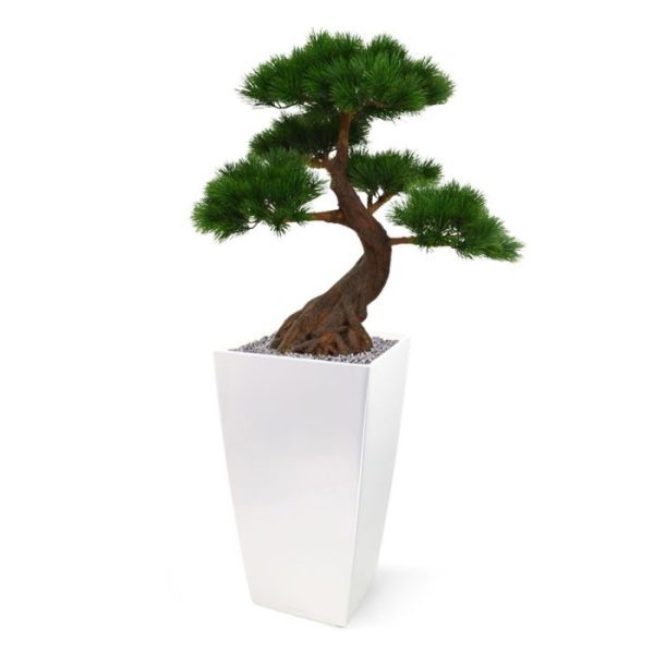 Kunstplanten zelfs de naaldtakken voelen heel echt! De authentieke vorm