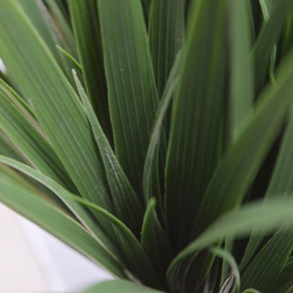 Kunst-Bamboegras-boeket-25-cm-UV-3 zonder pot. De afgebeelde sierpotten zijn tegen meerprijs leverbaar. Vanaf 24 stuks geldt een staffel korting.